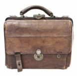 Early 20th century leather Gladstone-style travelling bag with opening front section opening to
