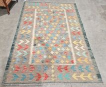 Turkish Anatolian grey ground kilim with eight stepped rows of eighteen multicolour lozenge