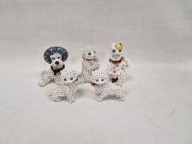 Five mid-century Italian pottery spaghetti cats and a dog wearing a sombrero, the cats with pink