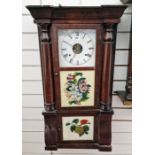 American wall clock of rectangular form with three glazed panels, two decorated with fruit and