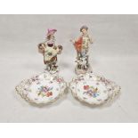 Two Continental porcelain figures, a German figure of a gallant with a hound (lacking left hand) and