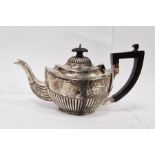 Early 20th century silver teapot, ebony finial and handle, semi-gadrooned, Birmingham 1903, maker