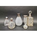 Silver-mounted cut glass scent bottle, ovoid, Chester assay, a smaller spherical scent bottle,  a
