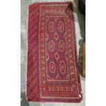 Eastern red ground rug with two rows of three elephant foot guls, multiple geometric borders 150cm x