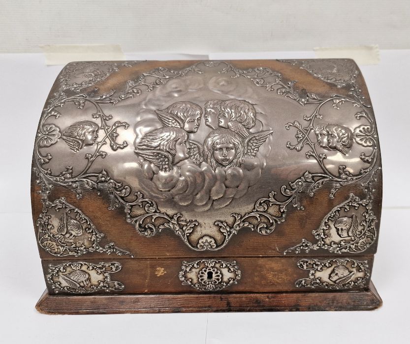 Early 20th century silver-mounted leather stationery box, repousse decorated with cherubs,