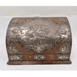 Early 20th century silver-mounted leather stationery box, repousse decorated with cherubs,