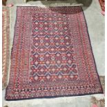 Eastern blue ground rug with floral and geometric field, multiple floral and single geometric