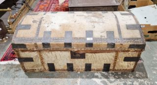 Late 19th century skin-bound trunk, possibly zebra, metal bound mounts throughout with twin handles,