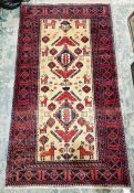 North east Persian meshed cream rug Belouch rug with two central stepped geometric medallions on