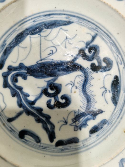 Two Chinese porcelain blue and white small plates, 19th century, each painted with a stylised bird - Image 25 of 32