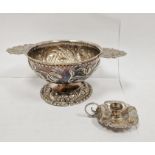 Continental white metal two-handled pedestal bowl, repousse decorated, marked indistinctly to the