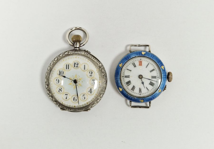 Early 20th century silver-cased fob watch and a silver cased ladies wrist watch, both having
