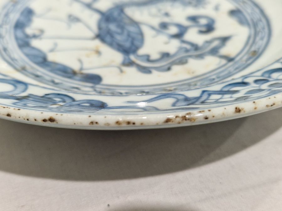 Two Chinese porcelain blue and white small plates, 19th century, each painted with a stylised bird - Image 20 of 32