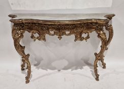 Reproduction gilt pier table with mirrored glass top, ornate pierced foliate and scroll apron, on