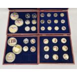 Collection of commemorative coins, in seven wooden cases, to include Winston Churchill copper gold