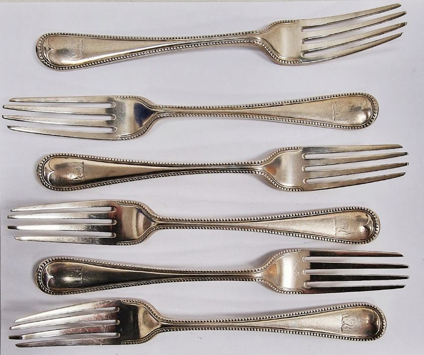 Set of six Victorian silver table forks, beaded decoration and crested handles, London 1872, maker