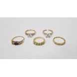 Five assorted silver gilt and gem set rings