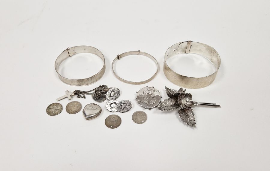 Assorted silver jewellery to include bangle, Charles Horner floral sprig brooch, heart-shaped locket