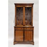 Reproduction display cabinet with astragal cupboard above pair of drawers and panel cupboard