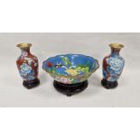 Modern Chinese cloisonne bowl, blue ground decorated with chrysanthemum and butterfly, within wave-