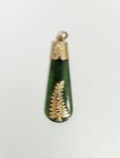 New Zealand jade pendant set with gold coloured mounts with leaf decoration inscribed 'Kia Ora'