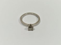 Platinum and solitaire diamond ring, the claw set stone 0.65ct approx.