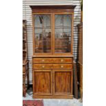 George III inlaid mahogany library bookcase having dentil and cavetto cornice, the top with two