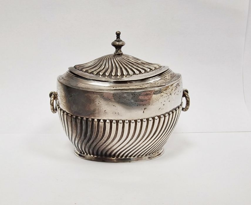 Victorian silver tea caddy, two-handled, oval shaped with gilt interior, London 1896, maker's mark