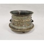 Middle Eastern gilt brass waisted two-handled pot, cast with frog feet, leaf shaped handles and