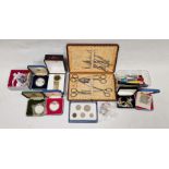 Silver-handled cased manicure set in fitted box, various coins, a small quantity of costume