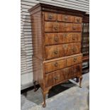 Early 18th century walnut chest on stand, the top with cavetto cornice, three short drawers above