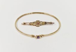 9ct gold and amethyst set bangle, 3.9g and a 15ct gold brooch set with seedpearls, 2.6g (2)