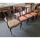 Set of three Victorian dining chairs with pierced carved backs, pink upholstered seats, on