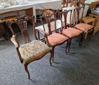 Set of three Victorian dining chairs with pierced carved backs, pink upholstered seats, on