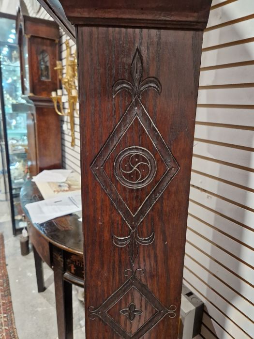 19th century heavily carved oak cased eight-day longcase clock, the 11" brass dial inscribed 'John - Image 17 of 45