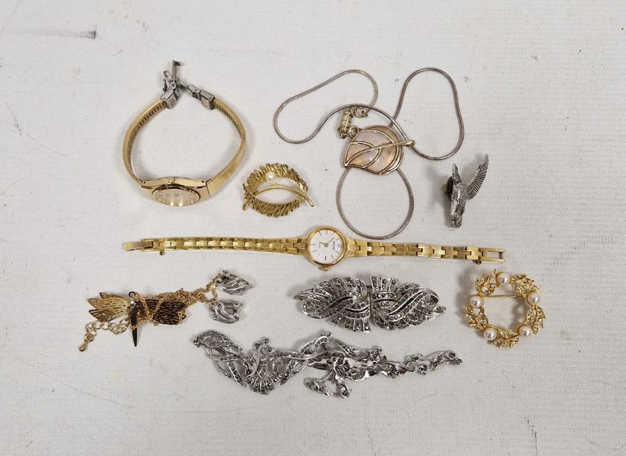 Small quantity of costume jewellery to include an Accurist lady's quartz wristwatch, a Seiko