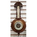 Small Victorian banjo barometer with arched top decoration with drop ball finials, visible aneroid