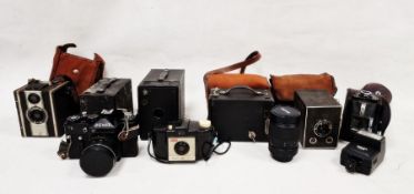 Vintage cameras to include a Kodak Brownie 127, a Zenit 11 camera etc., a Helios lens and Helios