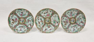 Three Canton famille rose small circular plates, 19th century, blue seal marks to reverse, each