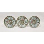 Three Canton famille rose small circular plates, 19th century, blue seal marks to reverse, each