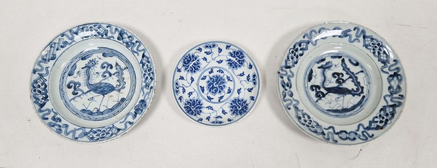 Two Chinese porcelain blue and white small plates, 19th century, each painted with a stylised bird