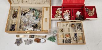 Two boxes of costume jewellery to include a gold-coloured pendant, heart-shaped pendant, silver