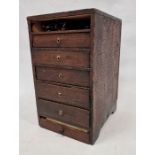 20th century stained wooden storage cabinet containing a quantity of assorted pocket watch