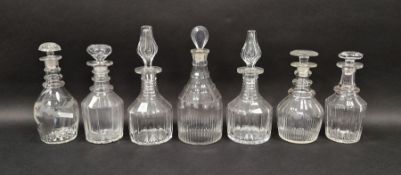 Seven 19th century cut glass decanters and stoppers, including an example engraved with leafy