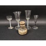 Three 18th century drinking glasses and another similar in the 18th century-style, two with opaque