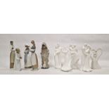 Four Nao porcelain figures, each depicting a boy or girl with animal, five porcelain groups