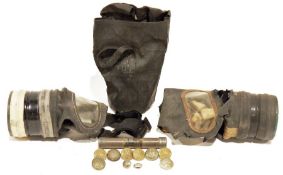 Two WWII gas masks, quantity of military buttons and other items