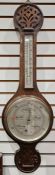 Early 20th century oak cased banjo barometer with relief carved decoration, 84cm