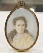 Late 19th Century School, watercolour on ivory, A portrait miniature of a young lady, signed Nina