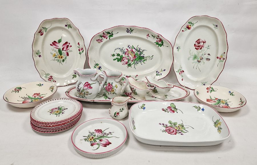 French 'Luneville' pottery part service decorated with floral sprays including three graduated